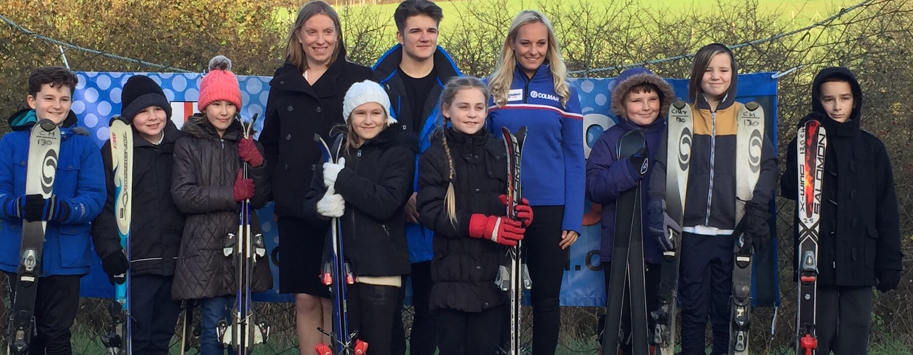Sports Minister Tracey Crouch with Mike Rowlands and Charlotte Evans and pupils from Hempstead Junior School low res