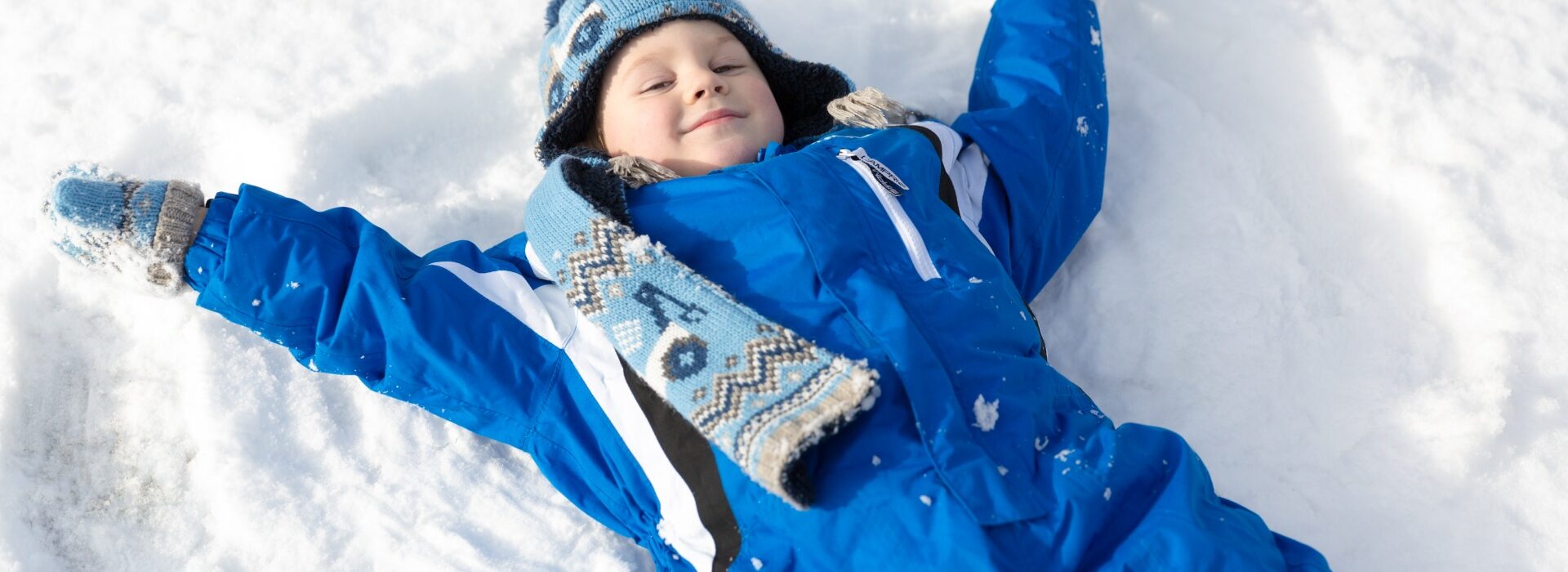 boy making snow angel 1443538838pyr
