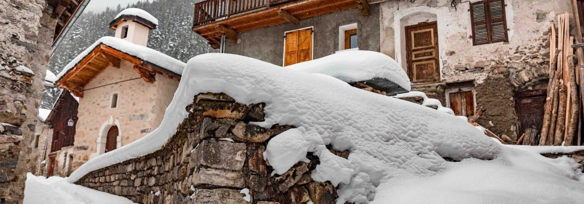 Pralognan-la-Vanoise village in the French Alps surrounded by snowy peaks