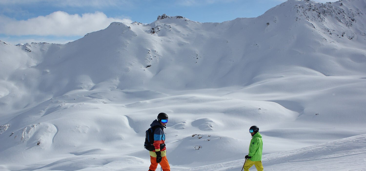 Skiers above Tignes, home to this Tignes ski deal