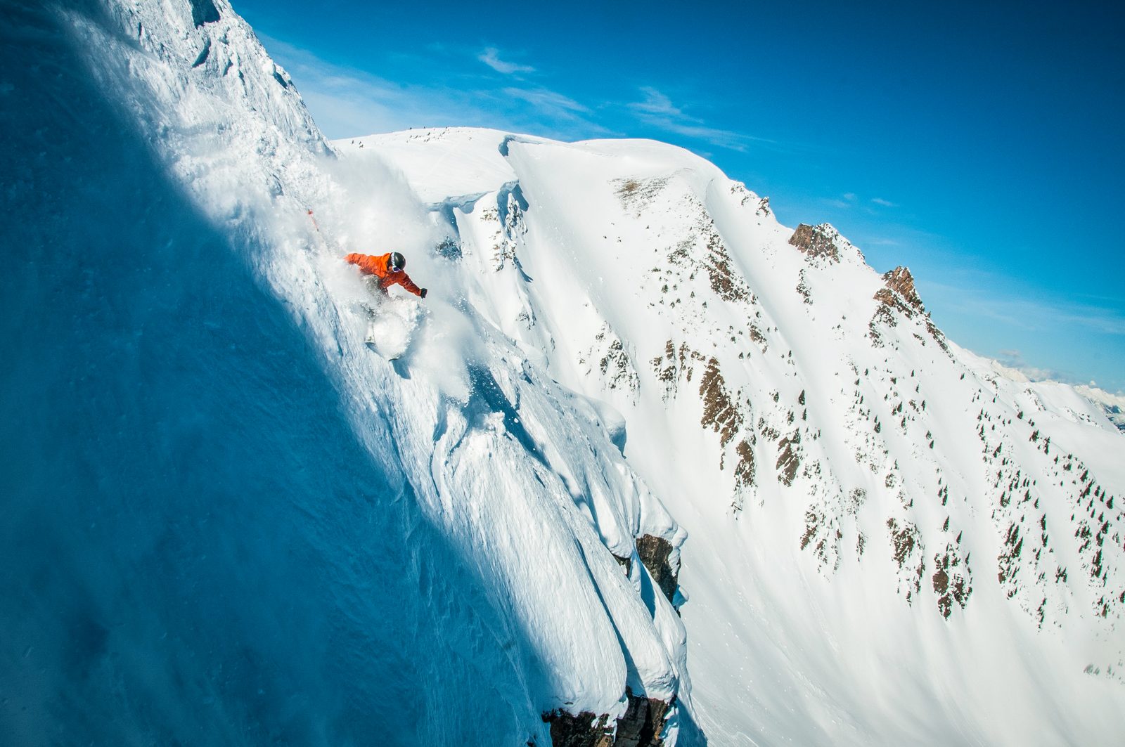 Freerider skiing a steep chute at Kicking Horse, Golden BC