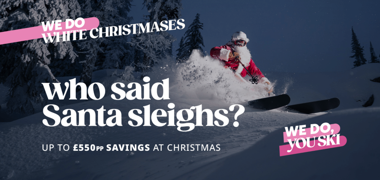 Skier dressed as Santa skiing powder - Skiworld Christmas ski deals, save up to £550pp